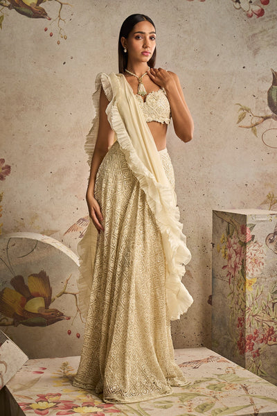 Ridhi-mehra-Ivory Net Embroidered Blouse and Heavy Embroidered Skirt Paired With Chiffon Organza Ruffled Drape